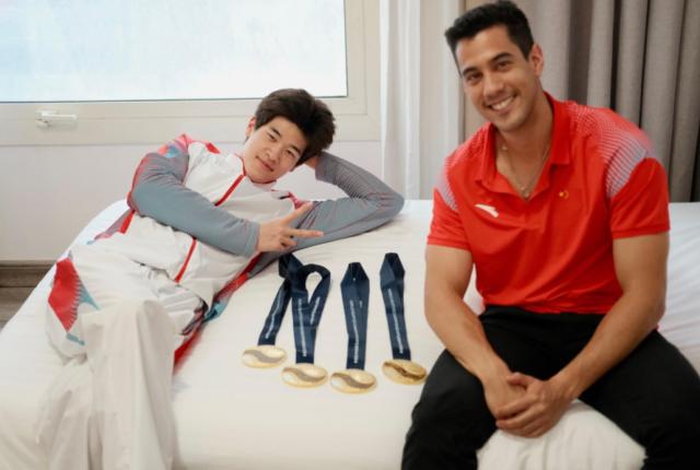 星空平台-葡体能教练：潘展乐夺金堪比博尔特北京奥运会伟绩